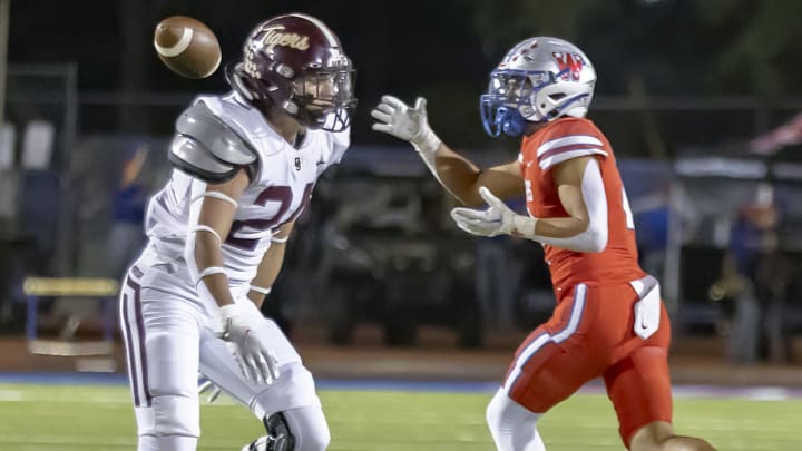 Westlake running back Nathan Acosta catches apass behind Dripping Springs in a UIL 6A District 26 game on Oct. 13, 2023.