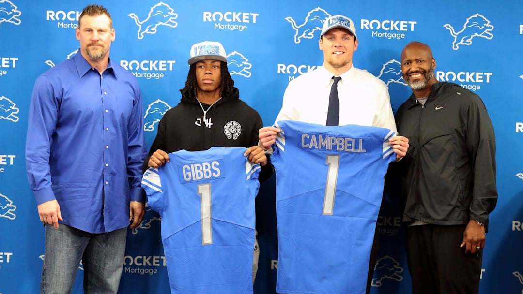 Detroit Lions coach Dan Campbell, Jahmyr Gibbs from Alabama, Jack Campbell from Iowa, and general manager Brad Holmes pose during the players' introductory news conference at team headquarters in Allen Park on Friday, April 28, 2023.