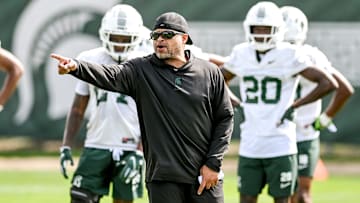 Michigan State's cornerbacks coach Demetrice Martin works with players during the first day of football camp on Tuesday, July 30, 2024, in East Lansing.