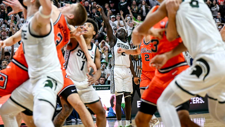 Michigan State's Kur Teng, center, watches as his 3-pointer drops in against Illinois during the second half on Saturday, Feb. 7, 2026, at the Breslin Center in East Lansing.