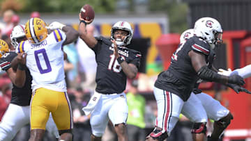 South Carolina quarterback LaNorris Sellers (16) passes near Louisiana State University defensive end Paris Shand (0) during the first quarter at Williams-Brice Stadium in Columbia, S.C. Saturday, September 14, 2024.
