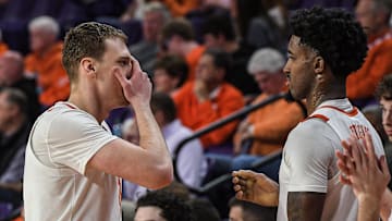 Clemson sophomore center Viktor Lakhin (0) interacts with forward Chauncey Wiggins (7) after he made a three point shot against Radford during the second half at Littlejohn Coliseum Thursday, November 21, 2024; Clemson, SC, USA.