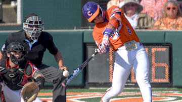 Clemson infielder Josh Paino (8) hits the ball agains University of Louisville during the bottom of the second inning at Doug Kingsmore Stadum in Clemson, S.C. Friday, April 18, 2025.