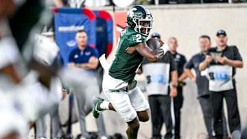 Michigan State's Aidan Chiles runs for a touchdown against Florida Atlantic during the second quarter on Friday, Aug. 30, 2024, at Spartan Stadium in East Lansing.