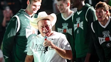 Michigan State men's basketball head coach Tom Izzo wears Gehrig Normand's cowboy hat during the Michigan State Madness event on Friday, Oct. 4, 2024, at the Breslin Center in East Lansing.