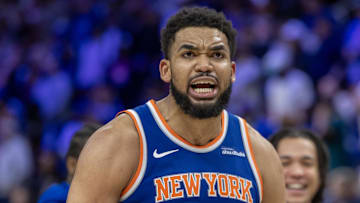 Apr 27, 2025; Detroit, Michigan, USA; New York Knicks center Karl-Anthony Towns (32) hits a three point basket late in the fourth quarter of game four of first round for the 2025 NBA Playoffs  against the Detroit Pistons at Little Caesars Arena. Mandatory Credit: David Reginek-Imagn Images