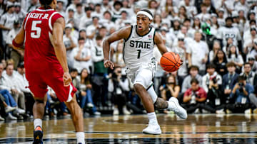 Michigan State's Jeremy Fears Jr. moves the ball as Arkansas' Darius Acuff Jr., left, defends during the first half on Saturday, Nov. 8, 2025, at the Breslin Center in East Lansing.