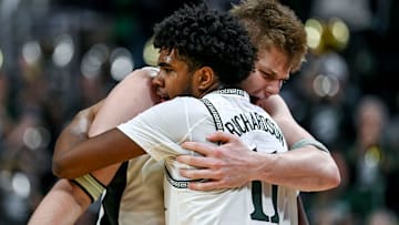 Michigan State's Jase Richardson, left, hugs Jaxon Kohler after the Spartans win over Wisconsin on Sunday, March 2, 2025, at the Breslin Center in East Lansing.