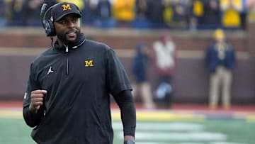 Michigan football coach Sherrone Moore celebrates a play during first-half action between Michigan and Minnesota at Michigan Stadium in Ann Arbor on Saturday, Sept. 28, 2024.