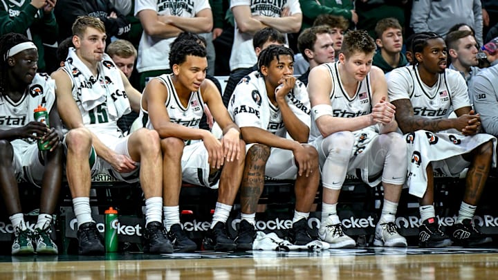 From left, Michigan State's Kur Teng, Carson Cooper, Divine Ugochukwu, Jeremy Fears Jr., Jaxon Kohler and Coen Carr looks on from the bench during the second half in the game against Maryland on Saturday, Jan. 24, 2026, at the Breslin Center in East Lansing.