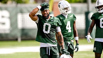 Michigan State's Alante Brown takes a break during the first day of football camp on Tuesday, July 30, 2024, in East Lansing.