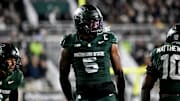 Michigan State's Jordan Hall celebrates after a stop against Michigan during the second quarter on Saturday, Oct. 25, 2025, at Spartan Stadium in East Lansing.