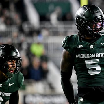 Michigan State's Jordan Hall celebrates after a stop against Michigan during the second quarter on Saturday, Oct. 25, 2025, at Spartan Stadium in East Lansing.