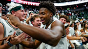 Michigan State's Cam Ward celebrates with fans after the Spartans victory over Arkansas on Saturday, Nov. 8, 2025, at the Breslin Center in East Lansing.