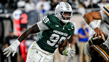 Michigan State's Quindarius Dunnigan pursues Western Michigan's Brady Jones during the fourth quarter on Friday, Aug. 29, 2025, in East Lansing.