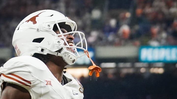 Texas Longhorns running back CJ Baxter celebrates a play in the second quarter. 