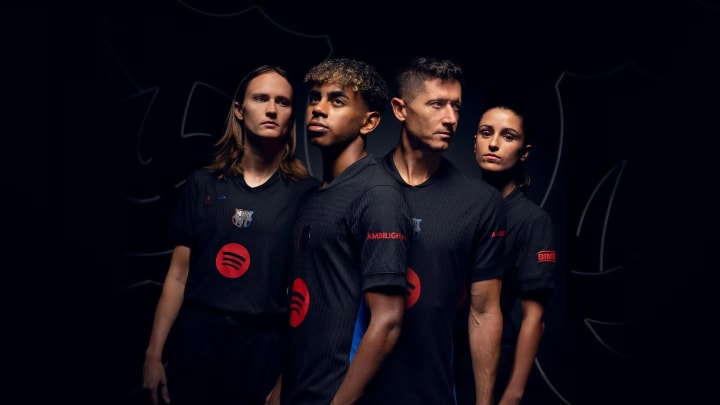 Barcelona unveil a black away kit