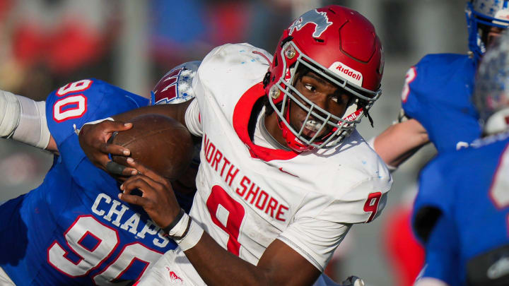 North Shore's Kaleb Bailey runs through the Westlake defense in the 6AD1 UIL football semifinal in Pflugerville on Dec. 9, 2023.