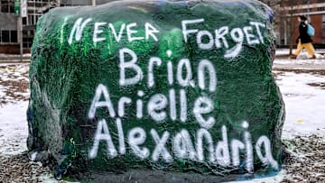 The Rock is painted as a tribute to the victims of Michigan State University shooting, Brian Fraser Arielle Anderson, and Alexandria Verner, on Wednesday, Feb. 12, 2025, on the MSU campus in East Lansing.