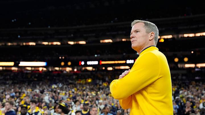 Michigan head coach Dusty May looks on from the court ahead of the NCAA national championship game against Connecticut at Lucas Oil Stadium in Indianapolis on Monday, April 6, 2026.