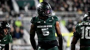 Michigan State's Jordan Hall celebrates after a stop against Michigan during the second quarter on Saturday, Oct. 25, 2025, at Spartan Stadium in East Lansing.