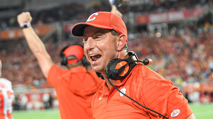 Clemson head coach Dabo Swinney celebrates after corner back Mario Goodrich (31) scored a touchdown after an interception during the third quarter of the 2021 Cheez-It Bowl at Camping World Stadium in Orlando, Florida Wednesday, December 29, 2021.

Ncaa Football Cheez It Bowl Iowa State Vs Clemson