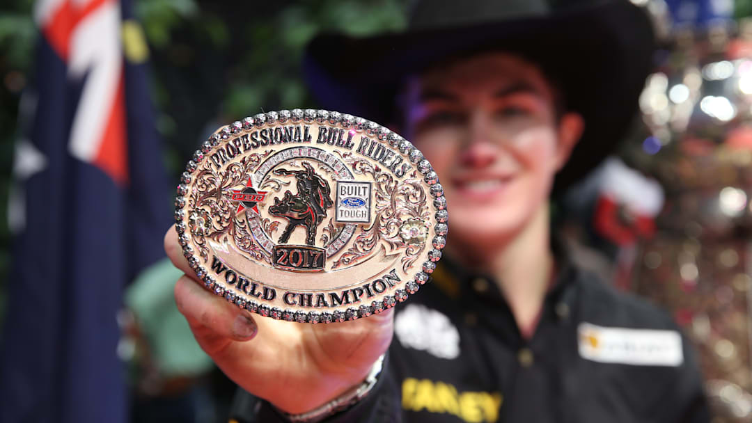 Jess Lockwood showinghis World Champion PBR buckle.