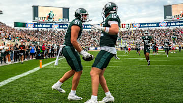 Michigan State's Michael Masunas, left, celebrates his touchdown catch with Jack Velling against Youngstown State during the third quarter on Saturday, Sept. 13, 2025, at Spartan Stadium in East Lansing.