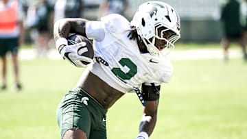 Michigan State's Aydan West runs with the ball during football practice on Monday, Aug. 11, 2025, in East Lansing.