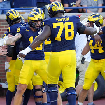 Michigan celebrates the touchdown by running back Donovan Edwards (7) during the 1st quarter against Fresno State at Michigan Stadium at Michigan Stadium in Ann Arbor on Saturday, Aug. 31, 2024.