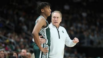 Michigan State coach Tom Izzo talks with guard Jeremy Fears Jr. during MSU's 88-64 win over Baylor on Saturday, Dec. 16, 2023, at Little Caesars Arena.