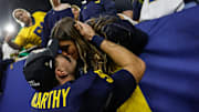 McCarthy kisses his fiance Katya Kuropas.