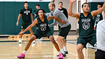 Michigan State's Jordan Scott, left, and Divine Ugochukwu participate in a drill during the first day of basketball practice on Monday, Sept. 22, 2025, at the Breslin Center in East Lansing.