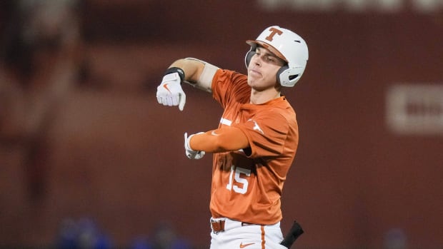 Texas third baseman Peyton Powell (15) reacts after getting to second base. 