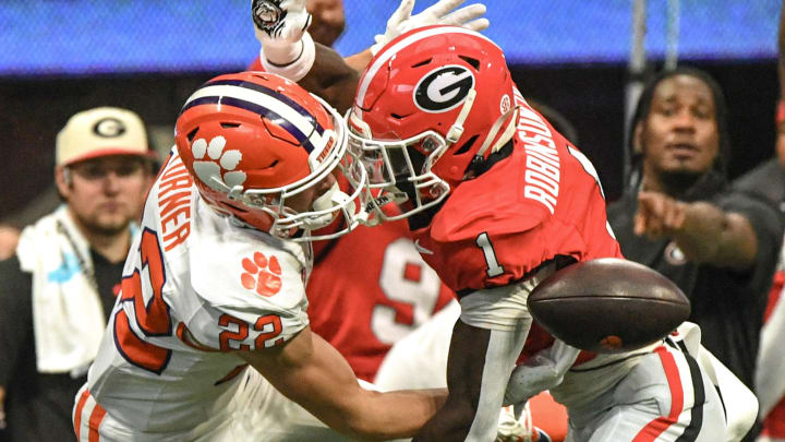 Aug 31, 2024; Atlanta, Georgia, USA; Georgia Bulldogs defensive back Ellis Robinson IV (1) breaks up a pass for Clemson Tigers wide receiver Cole Turner (22) during the fourth quarter of the 2024 Aflac Kickoff Game at Mercedes-Benz Stadium. Mandatory Credit: Ken Ruinard-USA TODAY Sports