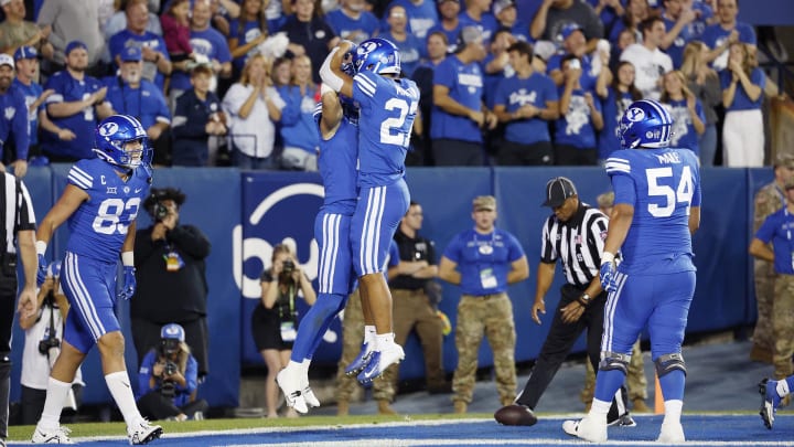 Chase Roberts and LJ Martin celebrate in the endzone