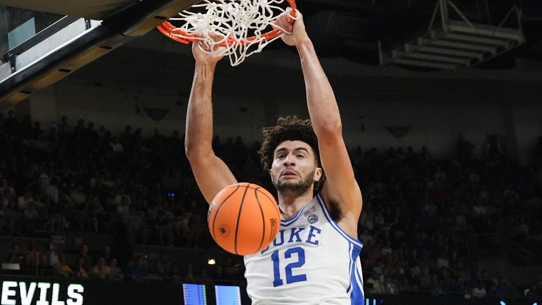 Duke Blue Devils forward Cameron Boozer (12) dunks March 21, 2026 during the second half of the NCAA Men’s Basketball Tournament second round East Region game with TCU at the Bon Secours Wellness Arena in Greenville, South Carolina.