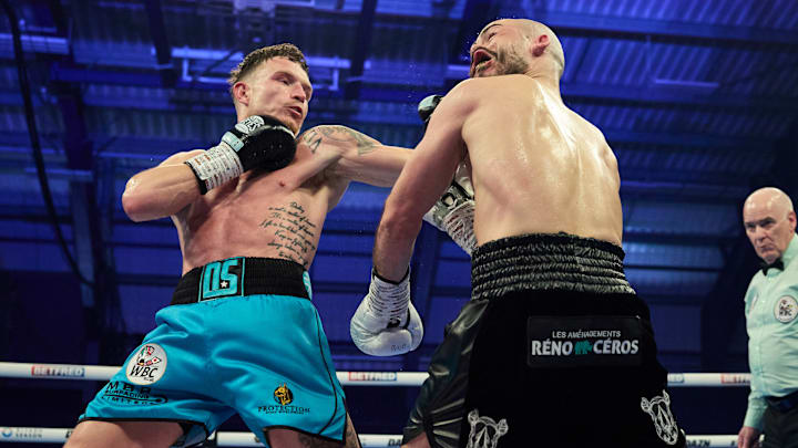 Dalton Smith lands a left hook against Mathieu Germain. Dalton Smith lands a left hook against Mathieu Germain.