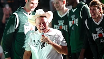Michigan State men's basketball head coach Tom Izzo wears Gehrig Normand's cowboy hat during the Michigan State Madness event on Friday, Oct. 4, 2024, at the Breslin Center in East Lansing.