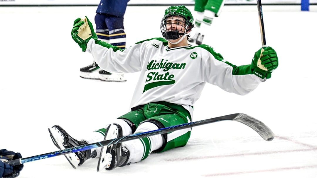 Michigan State's Porter Martone celebrates his empty net goal against Notre Dame during the third period on Thursday, Feb. 19, 2026, at the Munn Ice Arena in East Lansing.