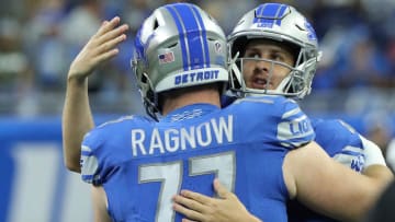 Detroit Lions quarterback Jared Goff (16) and center Frank Ragnow (77) warm up before action against the Atlanta Falcons Sunday, Sept. 24 2023.