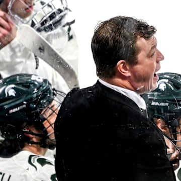 Michigan State's head coach Adam Nightingale calls out to players during the first period against Notre Dame in the Big Ten tournament on Saturday, March 15, 2025, at Muni Arena in East Lansing.