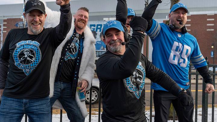 From left to right: Dan Campbell look-alike Bill Bowling, Josh Tait, Gerald Harten, Dante Dasaro and Marc Ferguson cheer alongside one another during a tailgate before the Lions vs. Commanders playoff game in Detroit on Saturday, Jan. 18, 2025.