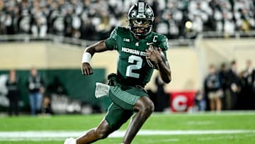 Michigan State's Aidan Chiles runs for a gain against Iowa in the second quarter on Saturday, Oct. 19, 2024, at Spartan Stadium in East Lansing.
