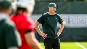 Michigan State's offensive coordinator Brian Lindgren looks on during the first day of football camp on Tuesday, July 30, 2024, in East Lansing.