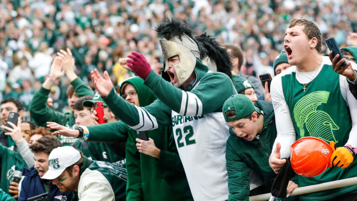 Michigan State fans celebrate their 37-33 win over Michigan at Spartan Stadium in East Lansing on Saturday, Oct. 30, 2021.