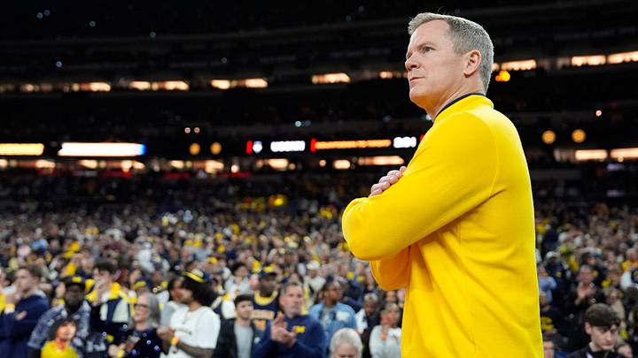 Michigan head coach Dusty May looks on from the court ahead of the NCAA national championship game against Connecticut at Lucas Oil Stadium in Indianapolis on Monday, April 6, 2026.