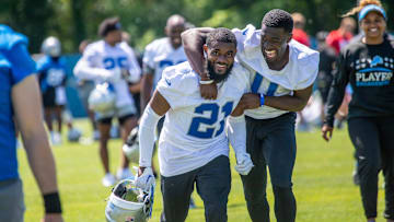 Detroit Lions cornerbacks Amik Robertson (21) and Terrion Arnold (0) run off the field after the Detroit Lions Organized Team Activities at their headquarters in Allen Park, Mich. on Thursday, May 23, 2024.