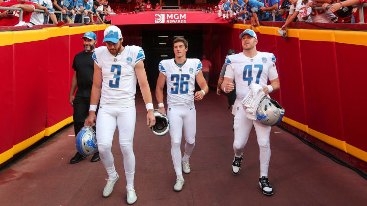 Long snapper Scott Daly comes out of the Lions locker room with punter Jack Fox (3) and kicker Riley Pattrson (36).