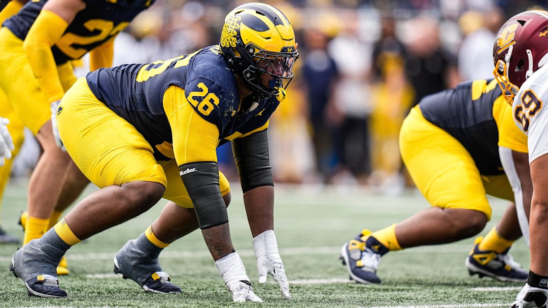 Michigan defensive lineman Rayshaun Benny gets ready for a play against Central Michigan